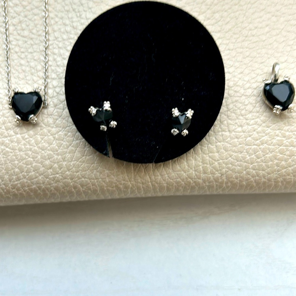 Tous black onix heart shape in silver set. Authentic.